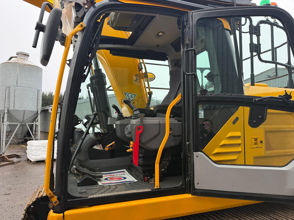 JCB 131X LC excavator cab interior and controls